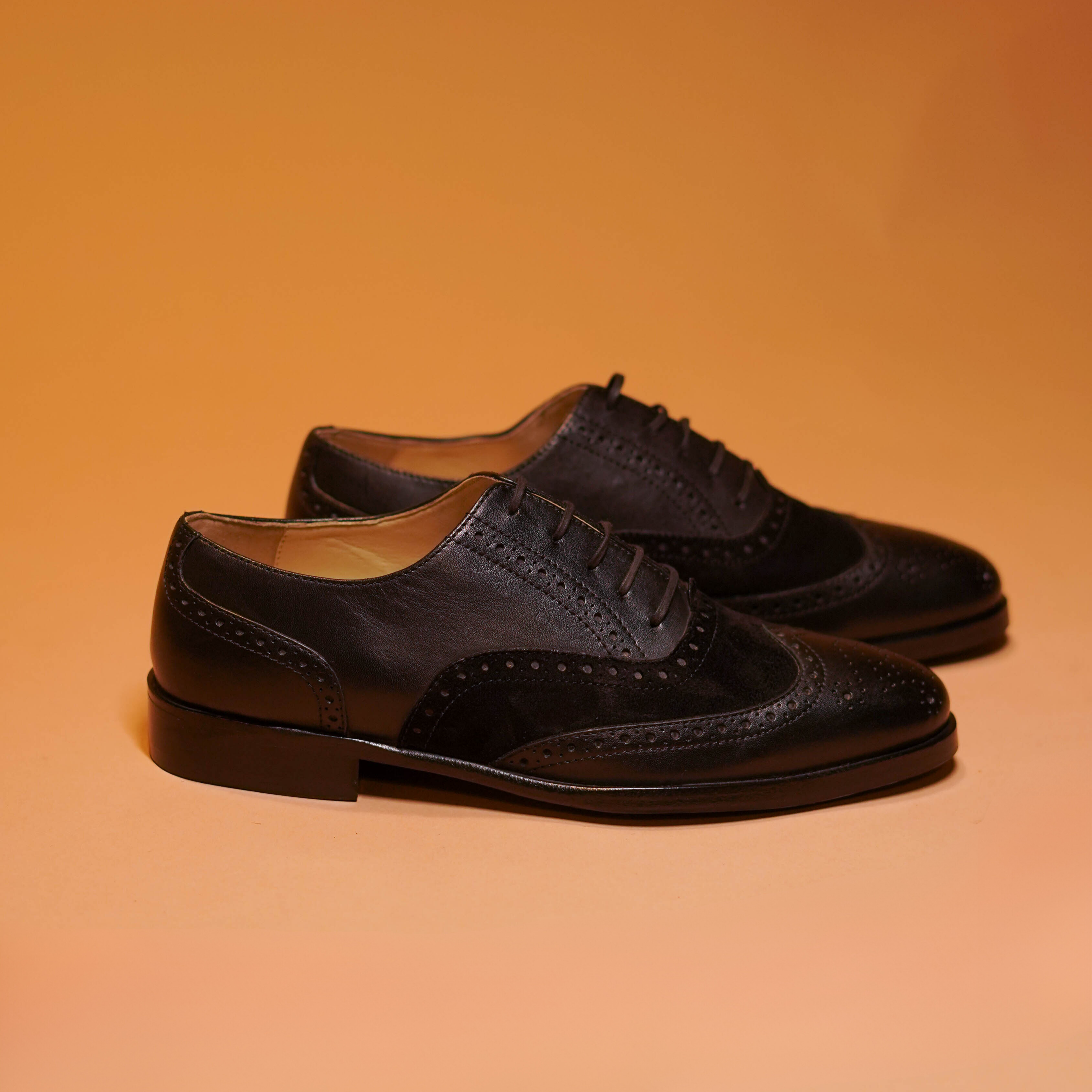 Caro Carbonio | Suede and Patent leather black brogues